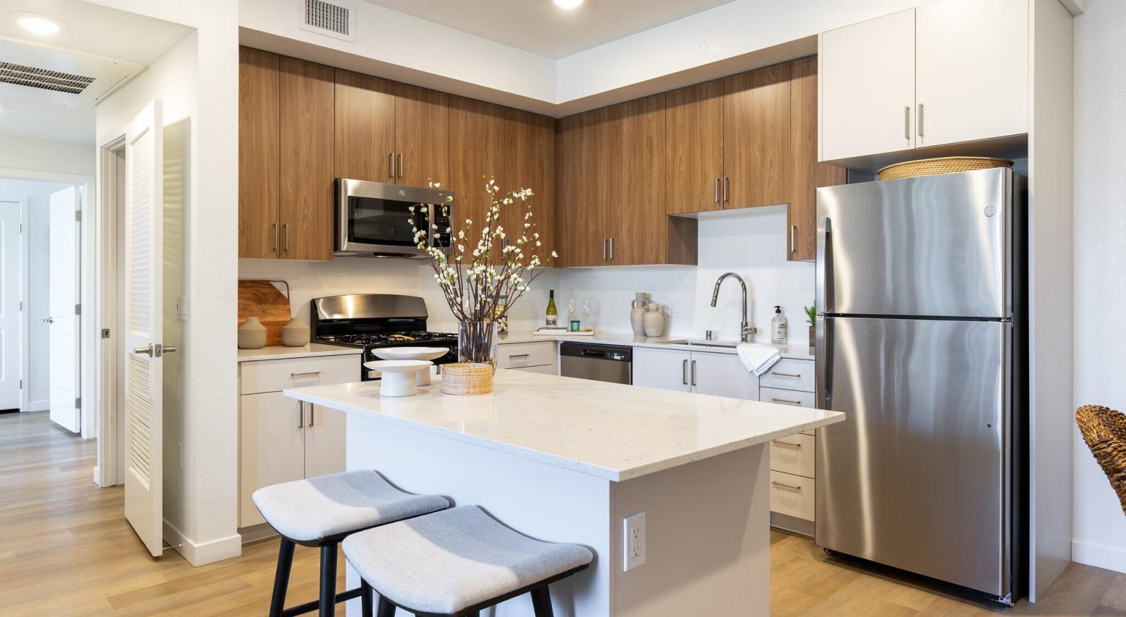 Beautiful kitchens with designer finishes a kitchen with a large island