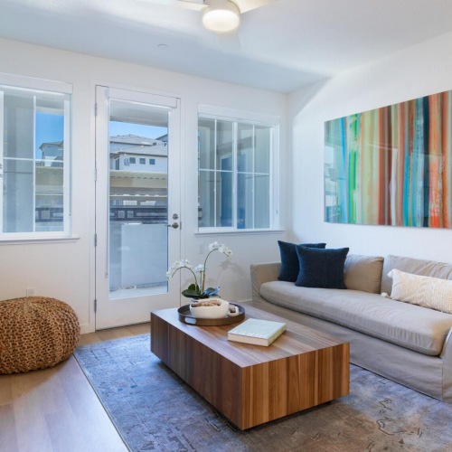 living room with access to private balcony